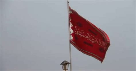 Iran Hoists the Red Flag of War Above Holy City