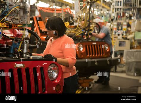 Toledo, Ohio - Workers assemble a Jeep at a Chrysler assembly plant ...