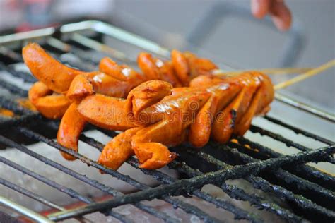 Grilled Sausage or Sosis Panggang on Grill in the Street Food ...