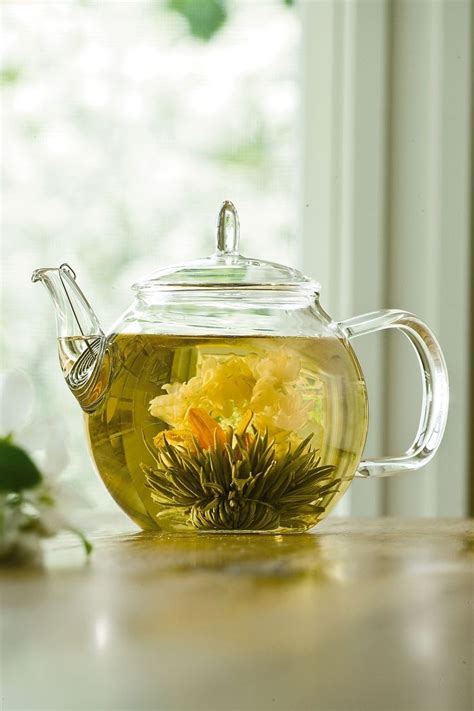 Tea Leaves & Teacups | Blooming flower tea, Blooming tea, Tea pots