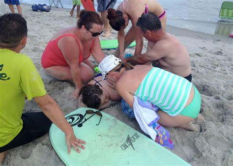 Shark attack victims were in waist-deep water, North Carolina officials say - CBS News