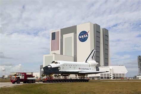 the space shuttle is on display in front of the nasa building