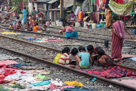 Brett Cole Photography | A slum area on the railway tracks near New ...