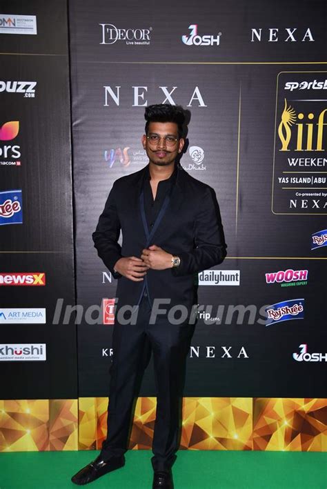 Anshul Garg poses on the green carpet of IIFA awards 2022 Media