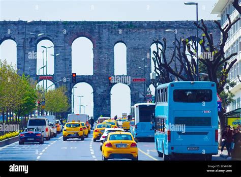 Street view with the Aqueduct of Valens (Turkish: Bozdoğan Kemeri) was a Byzantine aqueduct that ...