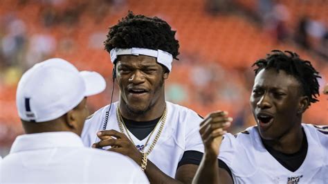 Baltimore Ravens quarterback Lamar Jackson receives support from ...