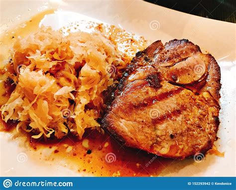 Dish of baked pork steak. stock photo. Image of meat - 152293942