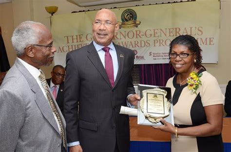 Jamaica GleanerGallery|Governor General Awards|Rudolph Brown/Photographer GG presents award to ...