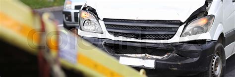 Car after an accident calls in on tow truck | Stock image | Colourbox