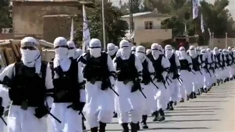 Taliban fighters march through Kandahar in uniform on Afghanistan's independence day | World ...