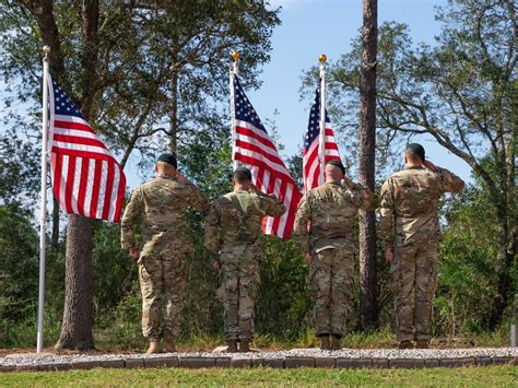 DVIDS - Images - Soldiers salute the flag during the ceremony. [Image 2 of 7]