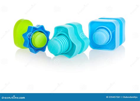 Plastic Bolts and Nuts in Blue, Green, Various Shapes, for Children, Isolated on a White ...