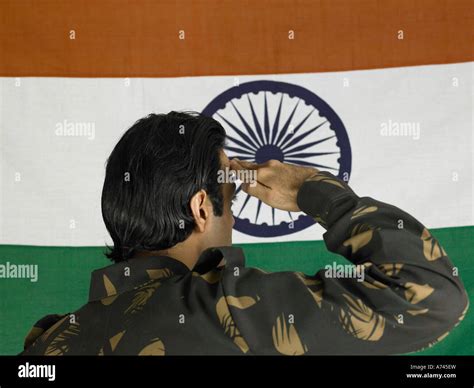 VDA 201746 Indian army soldier saluting and looking at flag of india ...