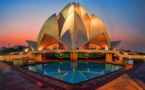 The Lotus Temple in New Delhi India It composed of free-standing marble-clad petals arranged in ...