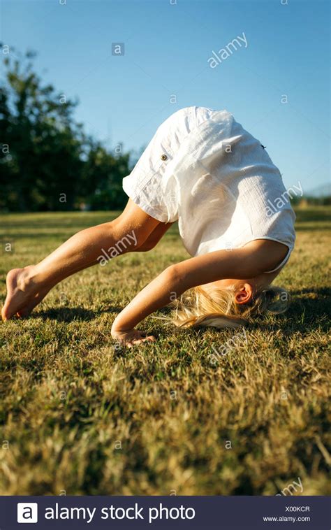 Little Girl Somersault High Resolution Stock Photography and Images - Alamy