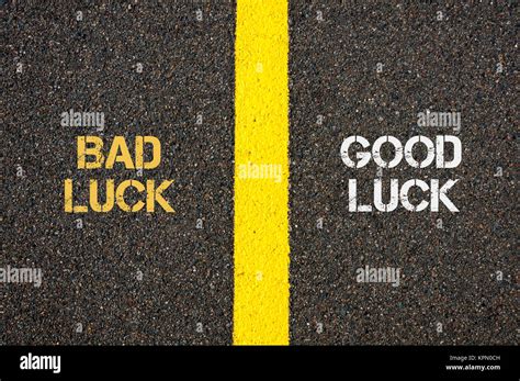 Antonym concept of BAD LUCK versus GOOD LUCK Stock Photo - Alamy