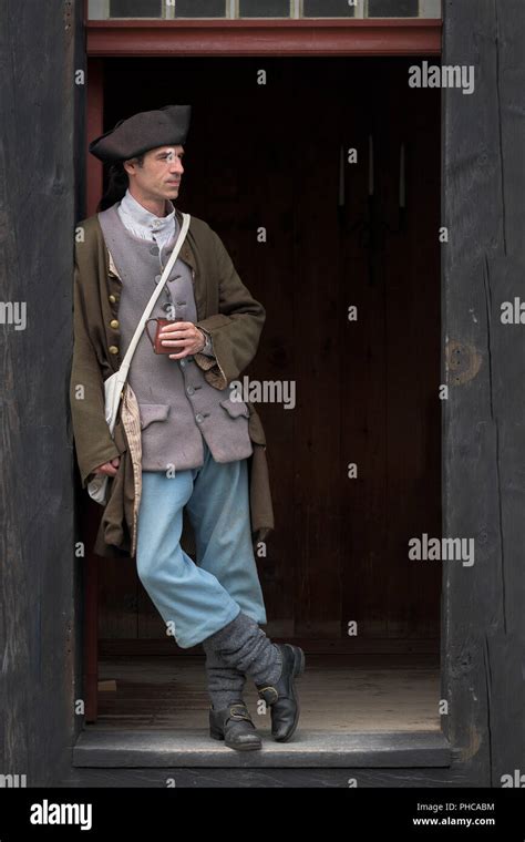 French soldier leaning inside doorway at the Fortress of Louisbourg National Historic Site of ...