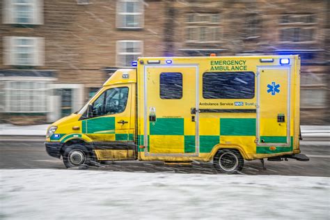 Ambulance Driving In A Winter Free Stock Photo - Public Domain Pictures