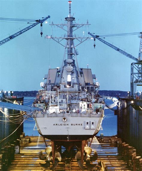 A stern view of the guided missile destroyer USS ARLEIGH BURKE (DDG-51) in floating dry dock ...