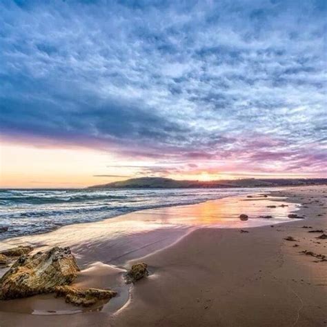 Watching the sun going down over Clifton Beach in southern Tasmania ...