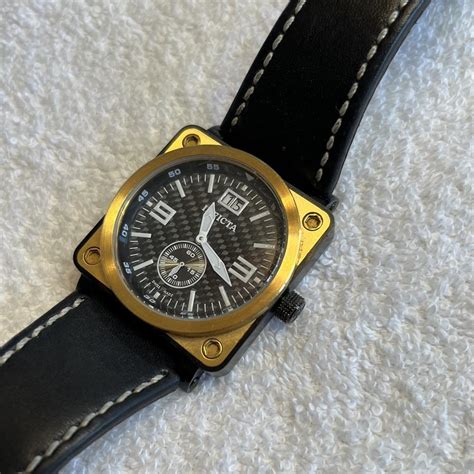 Invicta Men's Black and Gold Watch | Depop