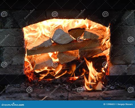 Burning firewood stock image. Image of cabin, burn, fireplace - 1398603