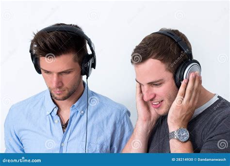 Two Friends Listening To Music Stock Photo - Image of casual, friends: 28214930