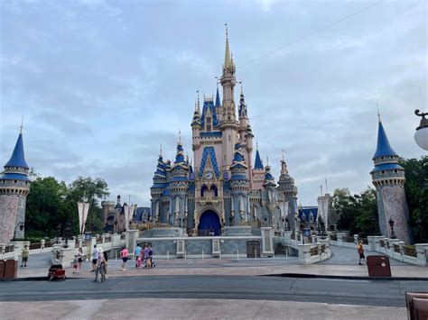 PHOTOS: '50' Medallion Removed From Cinderella Castle Clock at Magic Kingdom - WDW News Today