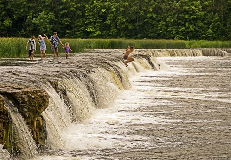 Evening at the waterfall at Kuldiga Latvia,longest in Europe - Martyn Goddard Images