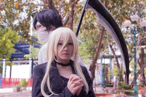 Male and Female Anime Character Cosplay With Scythe Beside Tree · Free ...