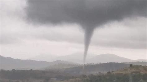 Two tornadoes seen as severe storms sweep across Queensland - ABC News