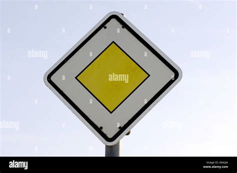 give way priority road sign yellow diamond german germany deustch Stock ...