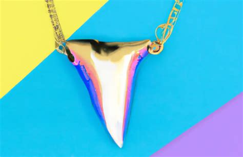 Shark Tooth Necklace Meaning: Symbolism And Significance - Symbol Genie