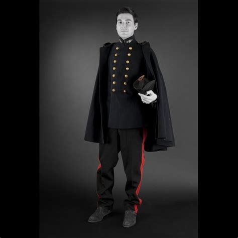 Polytechnicien uniform of black cloth comprising a cape, vest, trousers with double red bands ...