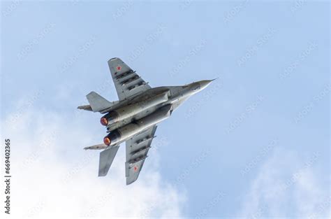 Mikoyan MiG-29 in the air with afterburner Stock Photo | Adobe Stock