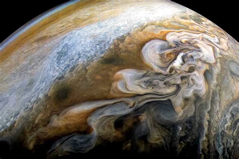 Stunning shot of Jupiter's swirling storms taken by Juno camera | New Scientist