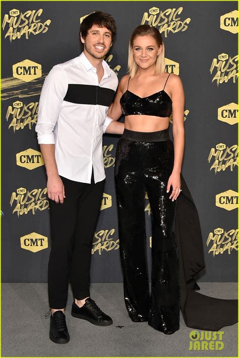 Photo: kelsea ballerini and husband morgan evans share a smooch at cmt ...