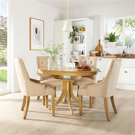 Hudson Round Oak Extending Dining Table with 4 Duke Oatmeal Fabric Chairs | Furniture And Choice
