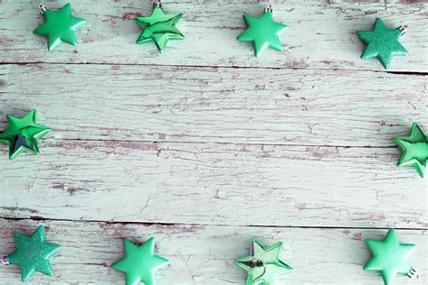 Photo of Green Christmas star border on rustic wood | Free christmas images