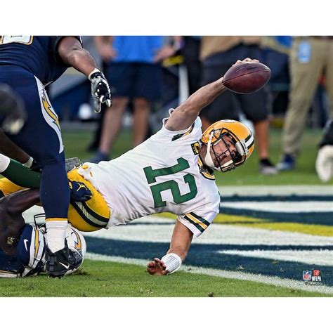 Aaron Rodgers Green Bay Packers Unsigned Scoring Touchdown Photograph ...