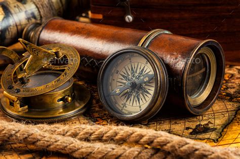 Old vintage compass and navigation instruments on ancient map Stock ...