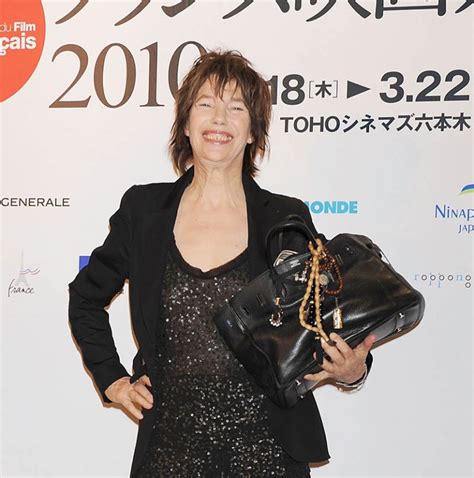 TOKYO – MARCH 18: Actress Jane Barkin holds her Hermes Birkin handbag ...