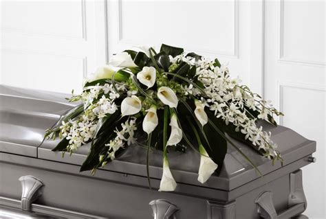 White calla lilyand orchid casket Spray in Hampton Falls, NH | Flowers by Marianne