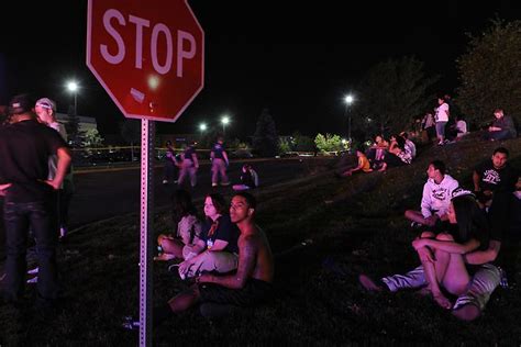 PHOTOS: Gunman Open Fires at a Midnight Showing of The Dark Knight ...