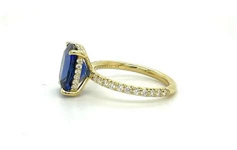 Cushion-Cut Sapphire Ring in a Yellow Gold Setting Los Angeles | Peter Norman