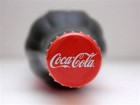 The Real Reason the Coca-Cola Logo Is Red | Reader's Digest