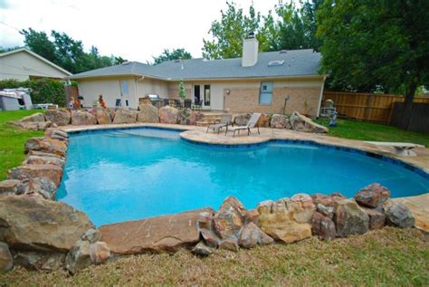 20 Landscaping Around Pool With Rocks To Enhance Your Oasis