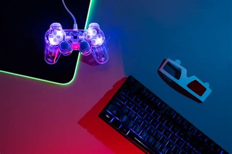 Free Photo | View of illuminated neon gaming keyboard setup and controller