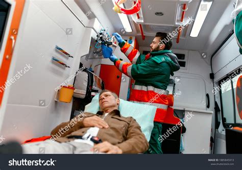 Male Paramedic Uniform Looks Oxygen Mask Stock Photo 1885845913 | Shutterstock