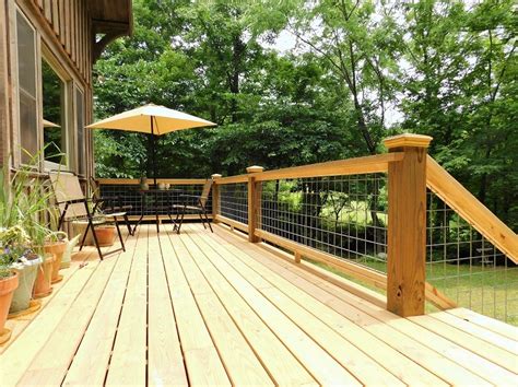A Cost-Conscious "See Through" Deck Railing Made with Livestock Panels - The Handyman Plan, LLC